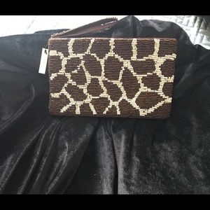 about color Bags - Small beaded wristlet bag. about color Bags - Small beaded wristlet bag.